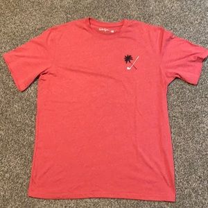 Pink Walter Hagen palm tree golf tee, size large.